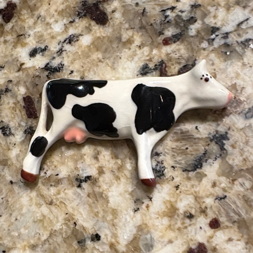 Original signed Parrot Pearls ceramic cow figure . Perfect Collectors condition